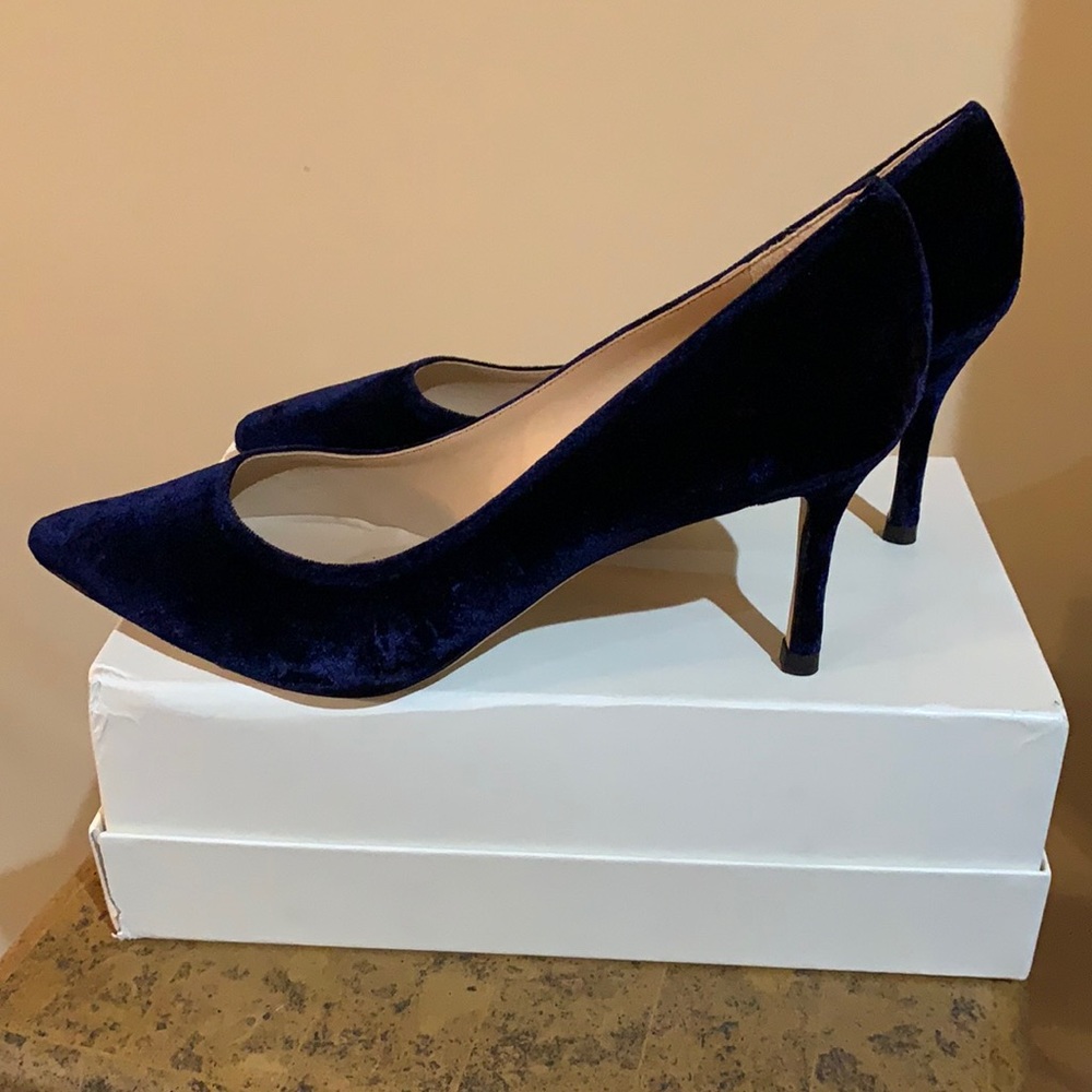 Never worn 42 size navy blue velvet shoes . 4 inch heel